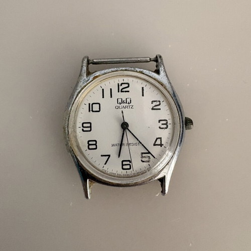 Q&Q Quartz wristwatch by Citizen, water resistant 10 Bar, no strap