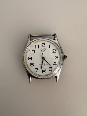 Q&Q Quartz wristwatch by Citizen, water resistant 10 Bar, no strap