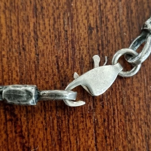 Traditional Gianniotiko Silver Necklace with Oval Motif and Tassels