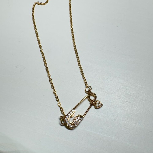 Chain new, gold color