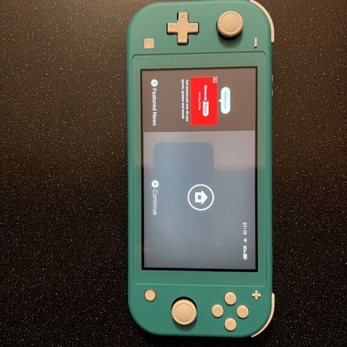 Nintendo Switch Lite turquoise like new, 32 GB, charger included