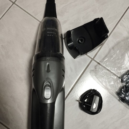 Bosch electric handheld vacuum used, small with charger