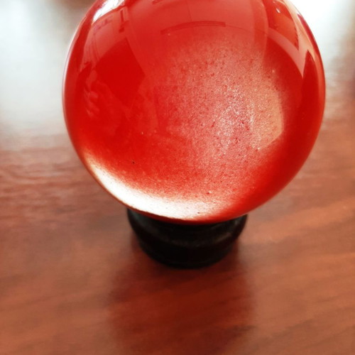 Indian crystal sphere red color on wooden base new