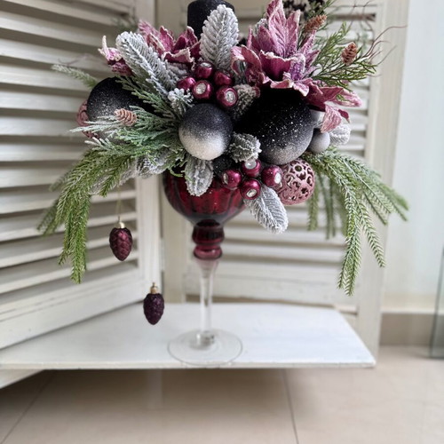 Christmas decoration in glass candlestick