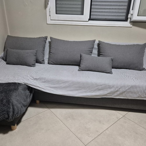 Corner sofa bed with storage, used