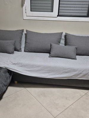 Corner sofa bed with storage, used