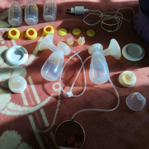 Lorelli breast pump used with Medela 150ml bottles