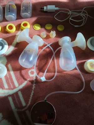 Lorelli breast pump used with Medela 150ml bottles