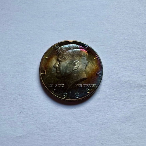 Kennedy Half Dollars 1986 D in excellent condition with rainbow patina