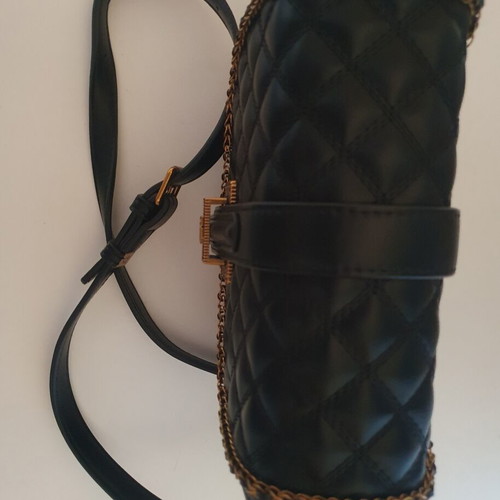 Quilted crossbody bag black with gold details like new