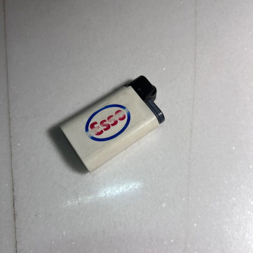 Esso promotional lighter used with synthetic fur tail