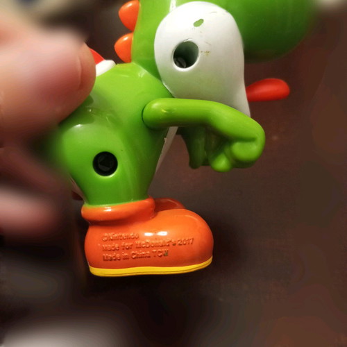 Children's toy like new with red button and tongue