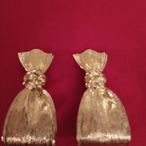Faux pouch clip-on earrings