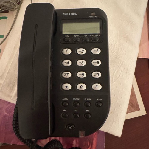 Telephone device like new, black wired