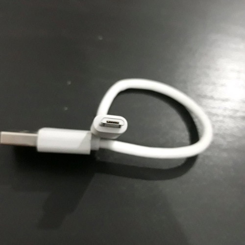 USB charger cable used, white color