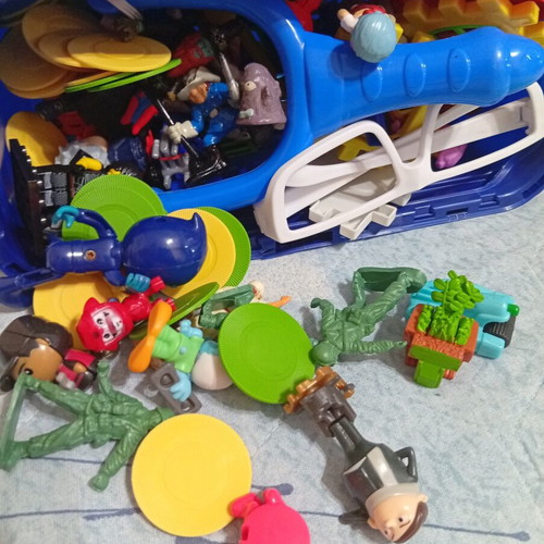 Toy pack with action figures, army men, and construction blocks like new