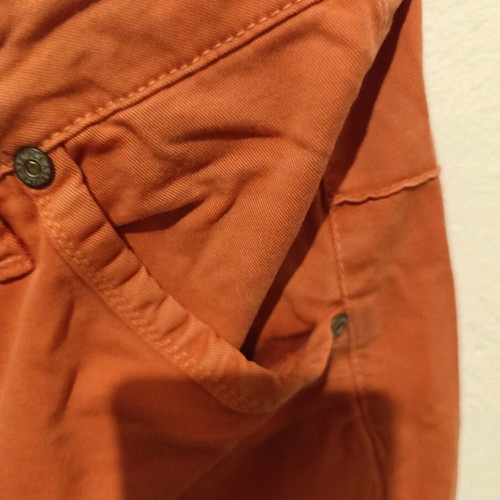 Please Italian orange jeans size M used
