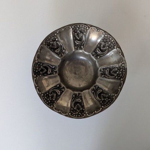 Vintage fruit bowl used with embossed design and three legs