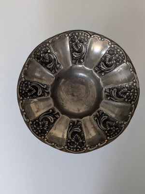 Vintage fruit bowl used with embossed design and three legs