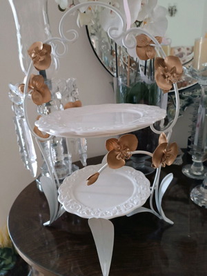 White platter with gold orchids like new, metal base with porcelain plates