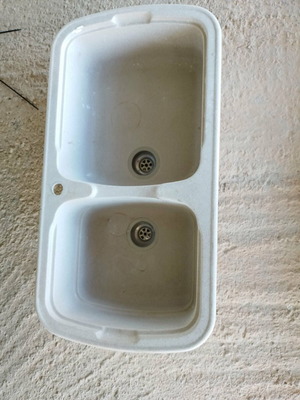 Double kitchen sink with faucet