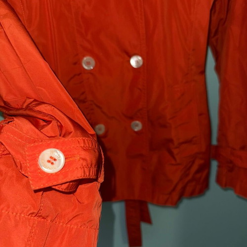 Henry Cottons red lightweight jacket used with detachable hood