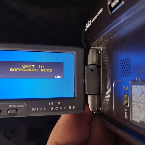JVC GR-D725E digital video camera used with charger and case