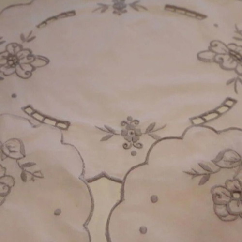 Set of three embroidered ecru table linens like new