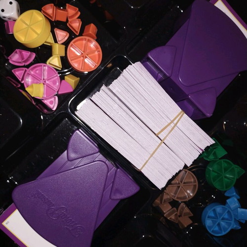 Trivial Pursuit Genius Edition used, missing 2 cards and yellow triangle