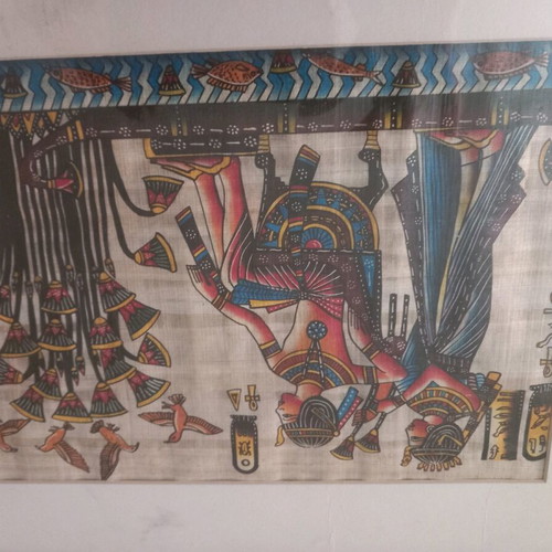Egyptian papyri used in frame