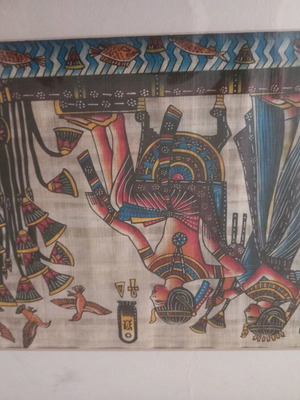 Egyptian papyri used in frame