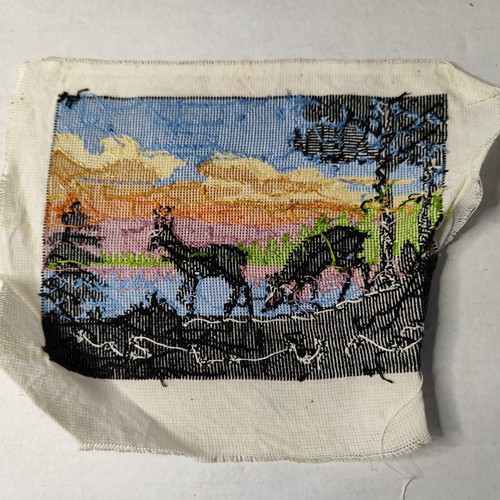 Vintage embroidery landscape with deer and sunset used