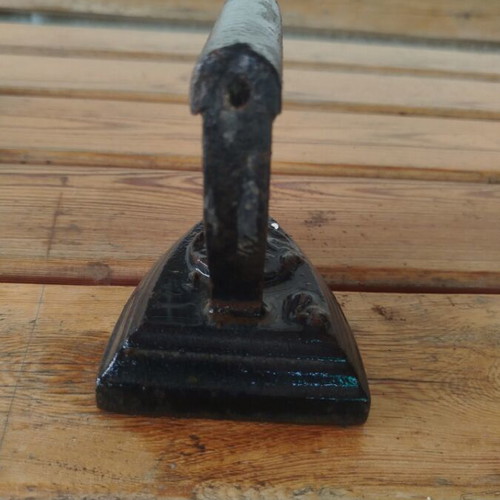 Old cast iron clothes iron used