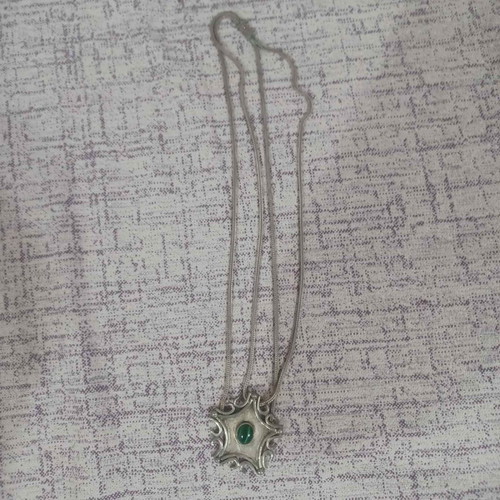 Handmade silver necklace used with double chain and green stone