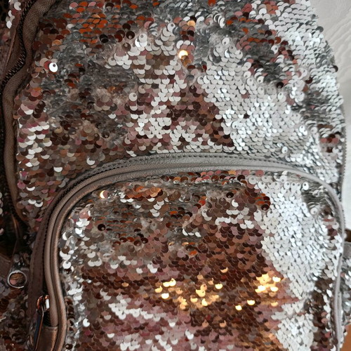 Lame backpack like new, silver