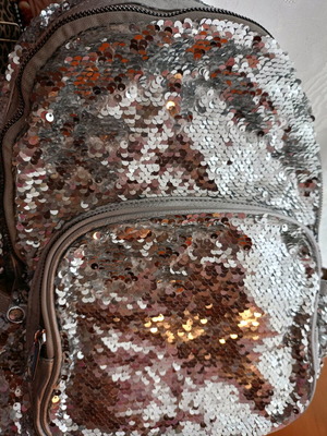 Lame backpack like new, silver