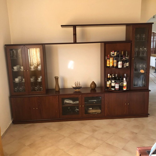 Solid beech wood living room unit like new with rotating bar