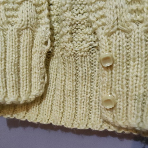 Sleeveless knitted vest used with pattern yellow pale