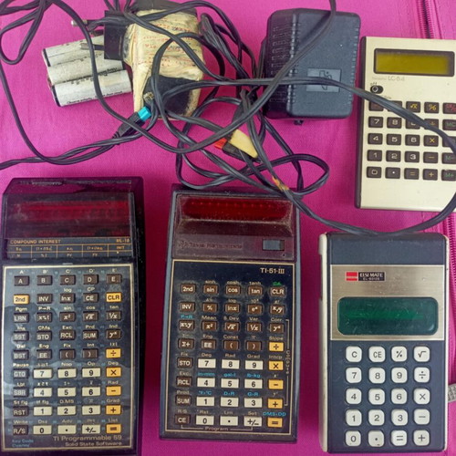 Texas Instruments programmable computers used with chargers