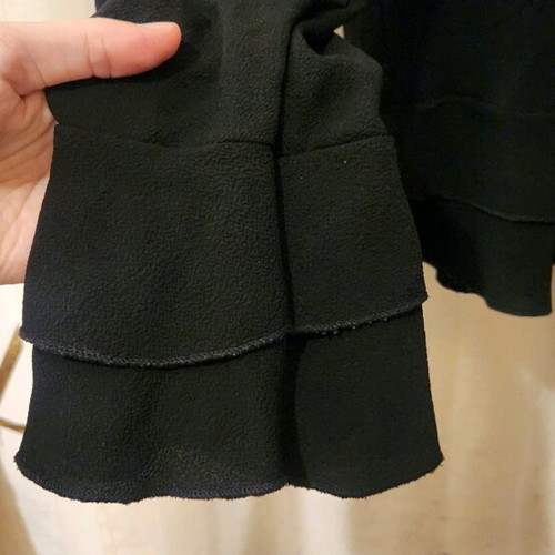 Black Atmosphere shirt like new with bows on the back