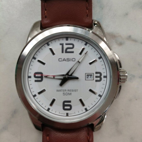 Casio men's watch like new with stainless steel and brown leather