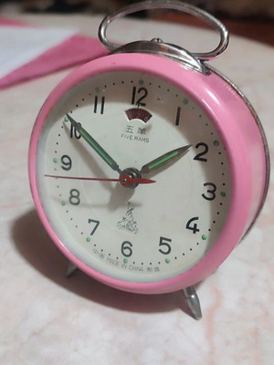 Five Rams table clock used, wind-up, pink