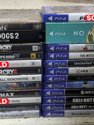 PS4 Games Bundle used, 21 titles with cases