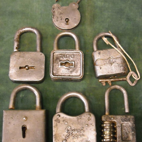 Collection of seven used old padlocks in various sizes