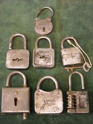 Collection of seven used old padlocks in various sizes