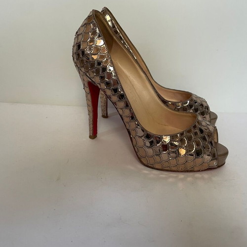 Christian Louboutin Metallic Heels size 38 used, bronze color