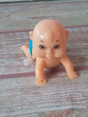 Funny Crawling Baby figure like new with wind-up