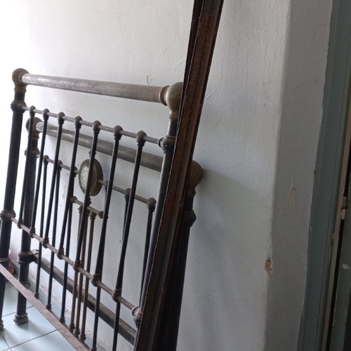 Solid iron bed with brass decorations used