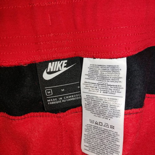 Nike sweatpants like new, red with black details, size M
