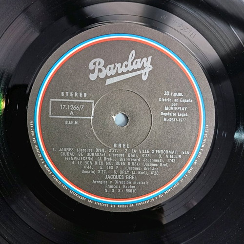 Vinyl records used, pack of 4 French pop artists including Adamo and Jacques Brel
